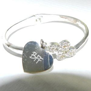 Silvertone rhinestone infinity loop and heart inscribed with BFF cuff bracelet